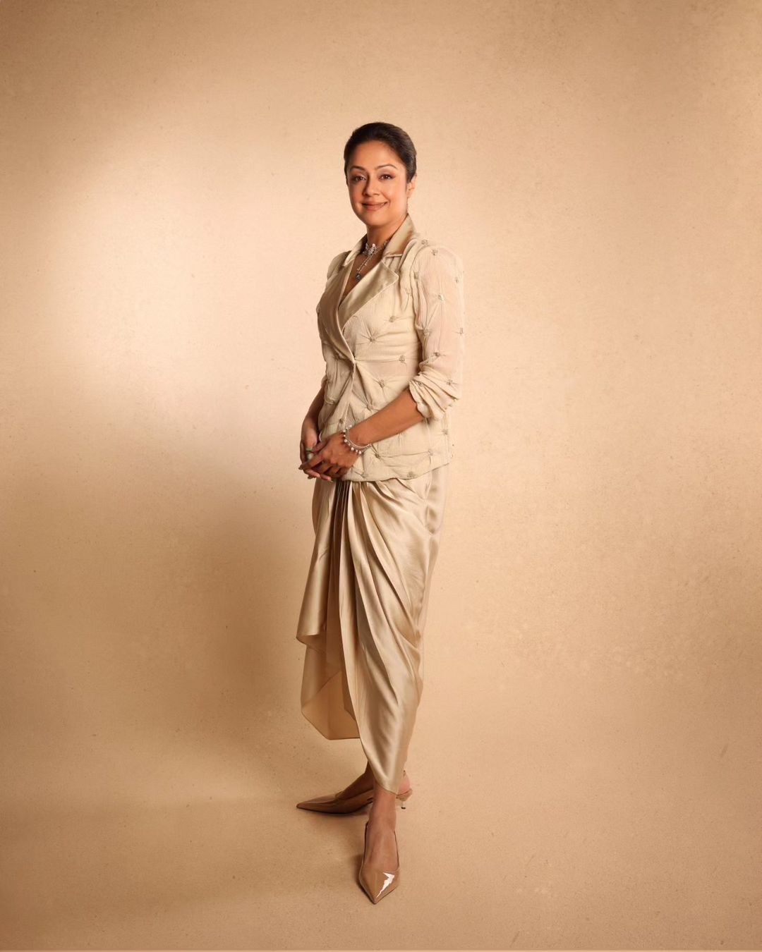 Tamil Actress Jyothika Stills In Grey Color Dress